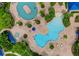 Beautiful aerial view of community pools and recreation area, perfect for relaxation at 2478 Brassica Dr, North Port, FL 34289