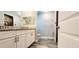 Bathroom features double vanity, granite countertops, and tile flooring at 342 Sweetwater Dr, Rotonda West, FL 33947