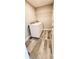 Functional laundry room features a washer, dryer, wire shelving, and wood look tile floors at 342 Sweetwater Dr, Rotonda West, FL 33947