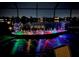 Backyard view with illuminated decorations at night at 349 Springview Nw Cir, Port Charlotte, FL 33948
