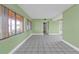 Bright living room with tiled floor and large window; a comfortable area for relaxation at 520 Sharon Cir, Port Charlotte, FL 33952