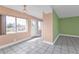 Inviting living room featuring tile floors, neutral paint, and natural light at 520 Sharon Cir, Port Charlotte, FL 33952
