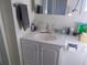 Bathroom featuring a white vanity, single sink, mirror, and towel bar at 5233 Palena Blvd, North Port, FL 34287
