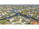 Aerial view of a waterfront home with a pool and boat dock at 9428 Bandera Ln, Port Charlotte, FL 33981