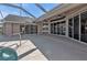 Spacious covered patio is designed for entertaining with its expansive layout and seamless transition to the pool area at 9428 Bandera Ln, Port Charlotte, FL 33981