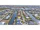 Aerial view of waterfront home along canals, with boats docked outside at 960 Messina Dr, Punta Gorda, FL 33950