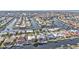 Stunning aerial view of waterfront homes along canals, many featuring private docks and swimming pools at 960 Messina Dr, Punta Gorda, FL 33950