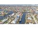 Panoramic aerial view of waterfront community with homes lining canals, showcasing waterfront living at 960 Messina Dr, Punta Gorda, FL 33950