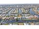 Wide angle aerial shot showcasing a waterfront community with direct gulf access at 960 Messina Dr, Punta Gorda, FL 33950