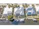 Aerial view of the backyard canal with a boat dock and direct access to the Gulf at 960 Messina Dr, Punta Gorda, FL 33950