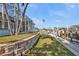 Manicured lawn with beautiful backyard leading to boat dock at 960 Messina Dr, Punta Gorda, FL 33950