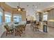Inviting breakfast nook with a ceiling fan and sun-drenched windows at 960 Messina Dr, Punta Gorda, FL 33950