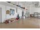 Spacious garage with ample storage, utility sink, and epoxy flooring, perfect for organization and projects at 960 Messina Dr, Punta Gorda, FL 33950