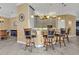 The kitchen features granite countertops, wooden cabinets, and pendant lights at 960 Messina Dr, Punta Gorda, FL 33950