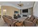 A stylish living room featuring leather furniture and a fireplace entertainment center at 960 Messina Dr, Punta Gorda, FL 33950