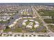 Aerial view of a waterfront community with lush landscaping and multiple residences at 1080 Bal Harbor Blvd # 4D, Punta Gorda, FL 33950