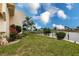 This property features a well manicured lawn, a variety of tropical plants, and water access at 1080 Bal Harbor Blvd # 4D, Punta Gorda, FL 33950