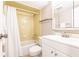 This bathroom has a shower, tub, white vanity with storage, and neutral paint at 1080 Bal Harbor Blvd # 4D, Punta Gorda, FL 33950