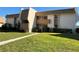 Inviting condo with well-manicured lawn and landscaping at 1080 Bal Harbor Blvd # 4D, Punta Gorda, FL 33950