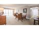 Comfortable living room area with sliding glass doors to balcony at 1080 Bal Harbor Blvd # 4D, Punta Gorda, FL 33950