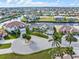 Expansive aerial view of a neighborhood near the water featuring mature landscaping and waterfront access at 1105 Rum Cay Ct, Punta Gorda, FL 33950