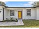 Close up of the beautiful, newly renovated, one-story home's front door at 1117 Vernon Ave, Port Charlotte, FL 33948