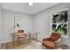 Cozy home office with natural light, desk, chair, and a comfortable sitting area for a productive work environment at 1117 Vernon Ave, Port Charlotte, FL 33948