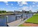 Enjoy serene waterfront living with private dock and boat lift at 1118 Treasure Cay Ct, Punta Gorda, FL 33950