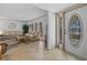 The entryway leads into the living space with tile floors and a decorative glass front door at 1118 Treasure Cay Ct, Punta Gorda, FL 33950