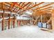 Spacious attic with wooden studs and duct work at 11723 1St E St, Treasure Island, FL 33706