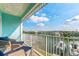 Balcony offers picturesque views of the canal and community, enhanced with comfortable seating for relaxation and enjoyment at 11723 1St E St, Treasure Island, FL 33706