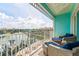 Relaxing balcony with comfortable seating offers views of the canal and waterfront community, providing relaxation at 11723 1St E St, Treasure Island, FL 33706