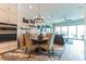 Cozy dining area with stylish decor and easy access to both the living area and the gourmet kitchen at 11723 1St E St, Treasure Island, FL 33706