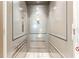 Interior elevator provides convenient and accessible transportation between floors, enhancing accessibility at 11723 1St E St, Treasure Island, FL 33706