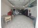Spacious garage with ample storage, organized shelving, and room for multiple vehicles and equipment at 11723 1St E St, Treasure Island, FL 33706