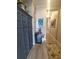 Inviting hallway with a built-in coffee bar and wine cooler, enhancing the home's entertainment and relaxation at 11723 1St E St, Treasure Island, FL 33706