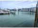Scenic waterfront view showcases boat docks and waterway access, perfect for boating enthusiasts and waterfront living at 11723 1St E St, Treasure Island, FL 33706