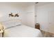 Comfortable bedroom with white accents and coastal decor at 1286 Green Oak Trl, Port Charlotte, FL 33948