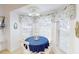 Cozy breakfast nook with natural light and nautical themed decor at 1286 Green Oak Trl, Port Charlotte, FL 33948