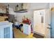 Garage with storage, utility sink, and access to the home's interior at 1286 Green Oak Trl, Port Charlotte, FL 33948