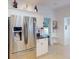 Kitchen featuring stainless steel refrigerator and ample counter space at 1286 Green Oak Trl, Port Charlotte, FL 33948