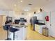 Bright kitchen with stainless steel appliances, granite countertops, and modern cabinetry at 1286 Green Oak Trl, Port Charlotte, FL 33948