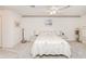 Bedroom with plush carpeting, ceiling fan, and decorative wall border at 1364 Ultramarine Ln, Punta Gorda, FL 33983
