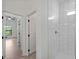 Modern bathroom featuring a walk-in shower with sleek tile and contemporary fixtures at 1790 New London St, North Port, FL 34288