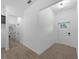 Bright foyer featuring tile floors, neutral walls and direct access to laundry room and garage at 1790 New London St, North Port, FL 34288