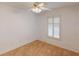 Neutral bedroom featuring a ceiling fan, a window, and neutral carpet at 20370 Mount Prospect Ave, Port Charlotte, FL 33952