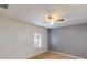 Comfortable bedroom with a ceiling fan, window with blinds, and neutral carpet at 20370 Mount Prospect Ave, Port Charlotte, FL 33952