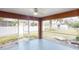 Enclosed patio offering an outdoor living space and backyard view at 20370 Mount Prospect Ave, Port Charlotte, FL 33952