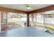 Enclosed patio offering an outdoor living space and backyard view at 20370 Mount Prospect Ave, Port Charlotte, FL 33952
