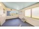 Bright sunroom with many windows providing natural light and views of the outdoors at 3120 Wisteria Pl, Punta Gorda, FL 33950